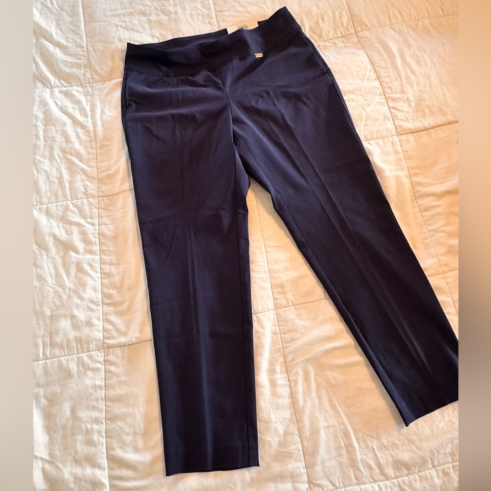 Women’s size 12 petit short dress pants. Tummy control. Skinny. Never worn.